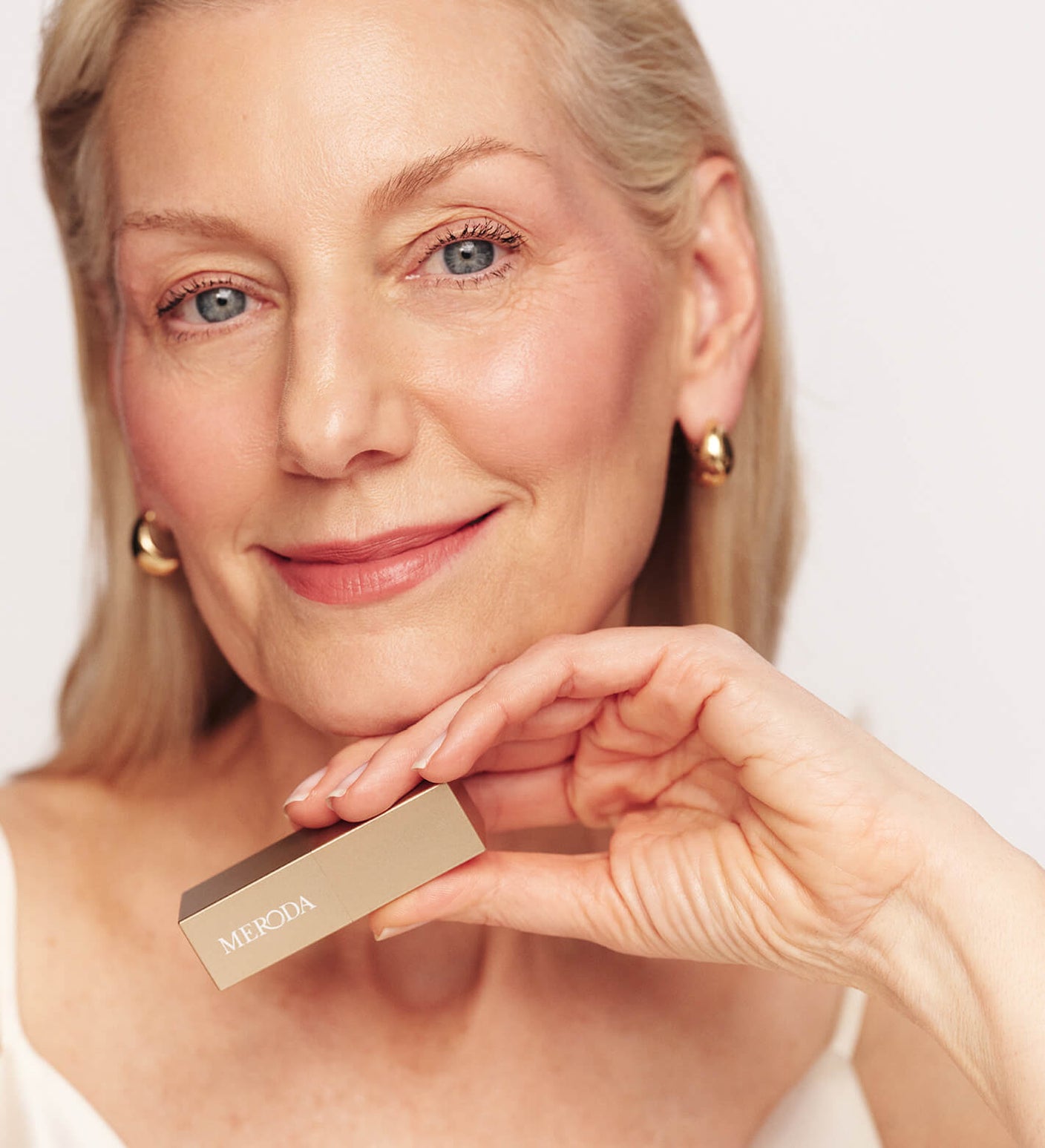 Velvet Dream Lipstick in Perfect Nude from The Valentines Bundle on a model for a natural, radiant finish.