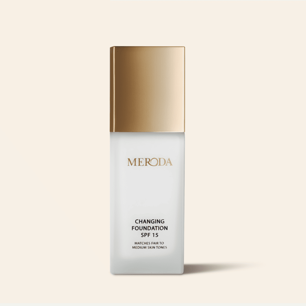 Changing Foundation SPF 15 bottle featuring a metallic gold cap and colour-adapting pigments.