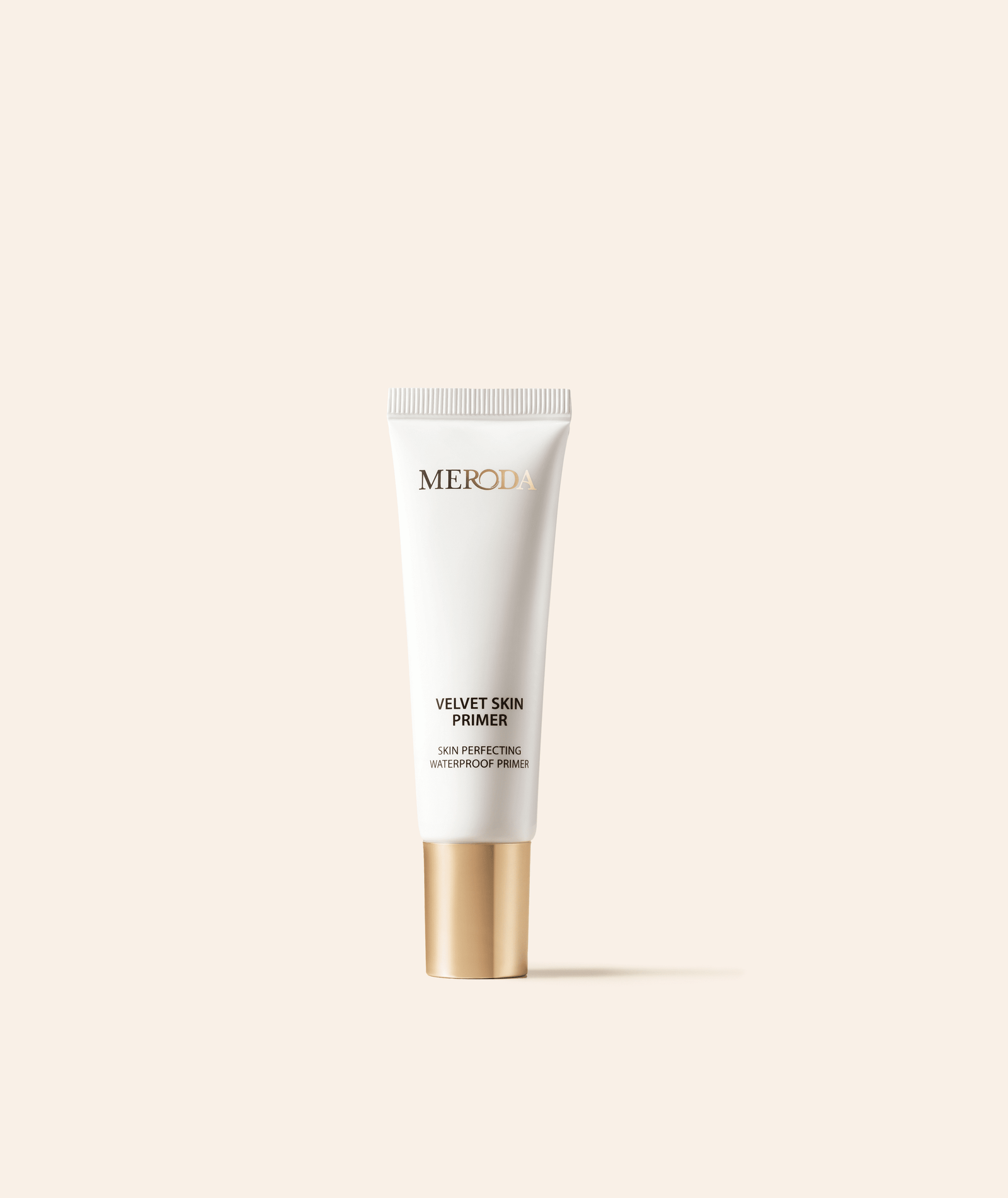 Velvet Skin Primer in a white tube with a gold cap, a smoothing waterproof base for a flawless complexion.