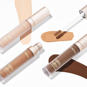 Universal Concealer in three shades with hydrating liquid swatches and a wand applicator for a natural finish.