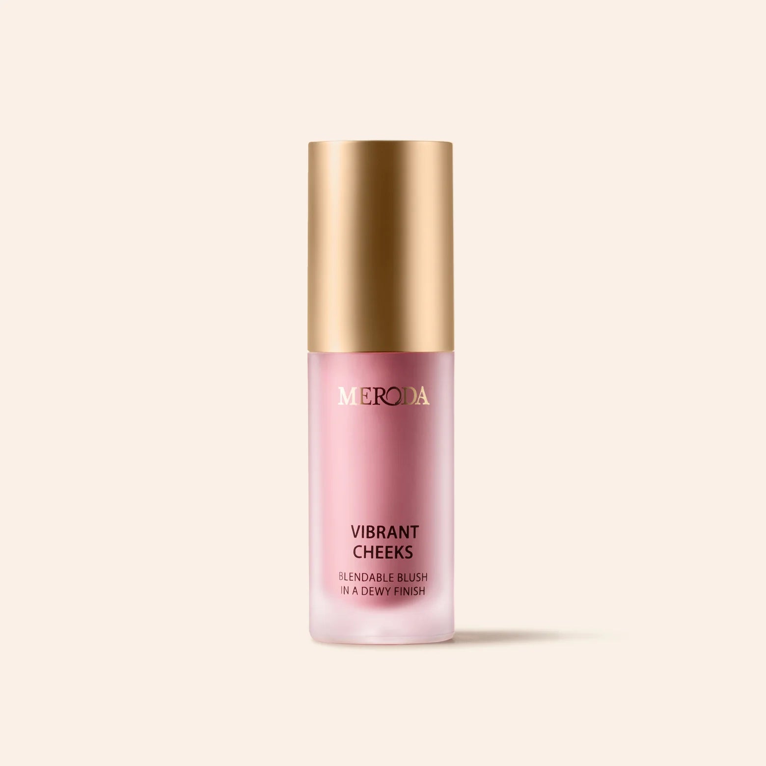 Vibrant Cheeks Liquid Blush in Grape Galore featuring a dewy purple shade in a gold-capped frosted bottle on cream.