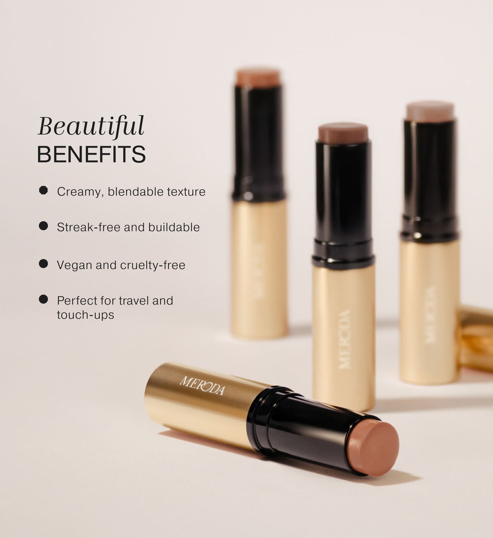 The Soft Tan Bronzer sticks in gold tubes with text detailing the creamy, buildable, and vegan formula.